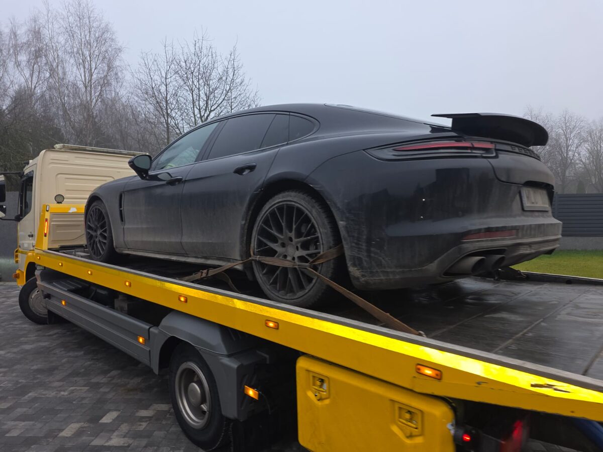 Premium car on a tow platform