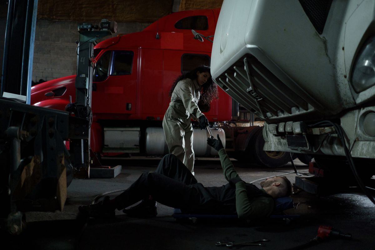 Truck assistance repair work in a garage